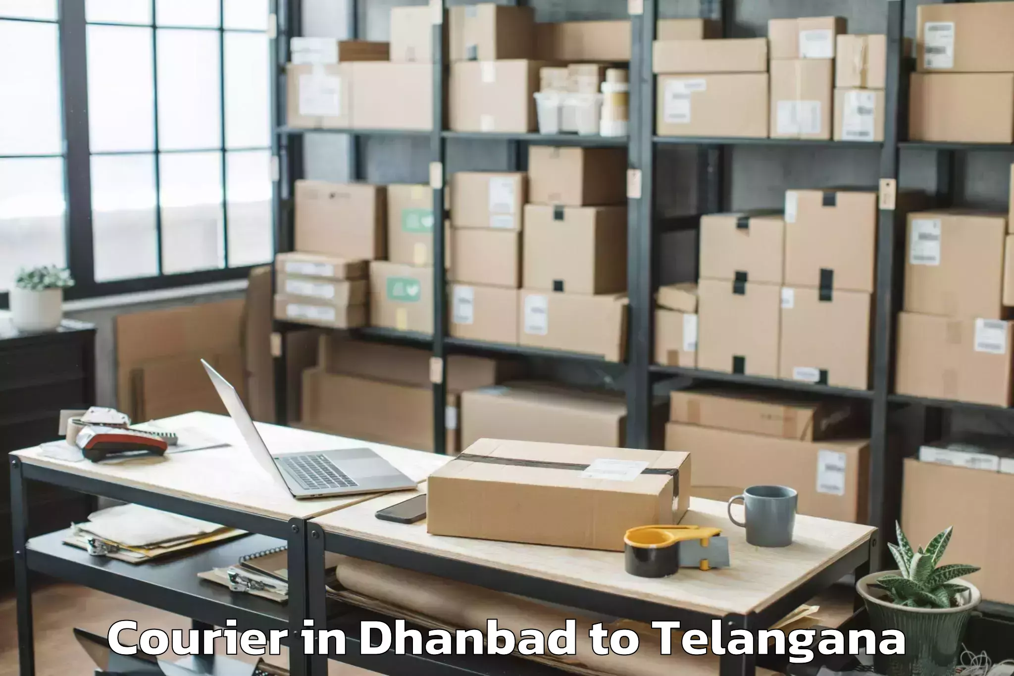 Reliable Dhanbad to Manneguda Courier